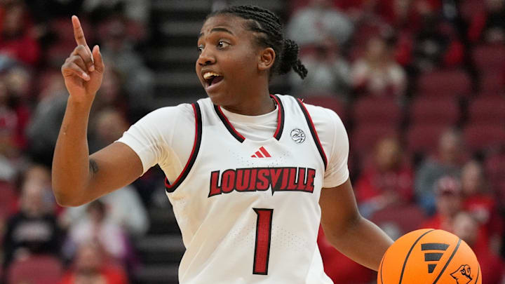 Louisville’s Reyna Scott brings the ball up court in the second half at the KFC Yum! Center on Thursday, January 1, 2026 Louisville’s Reyna Scott brings the ball up court in the second half at the KFC Yum! Center on Thursday, January 1, 2026