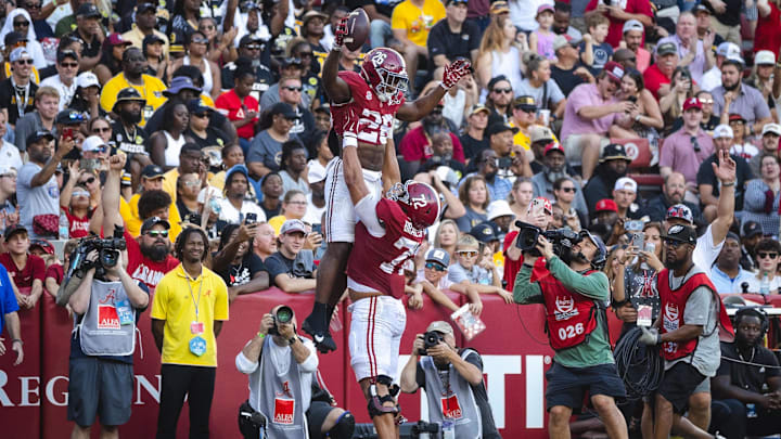 Oct 26, 2024; Tuscaloosa, Alabama, USA; Alabama Crimson Tide running back Jam Miller (26) celebrates with offensive lineman Parker Brailsford (72) after scoring a touchdown against the Missouri Tigers during the third quarter at Bryant-Denny Stadium. Mandatory Credit: Will McLelland-Imagn Images