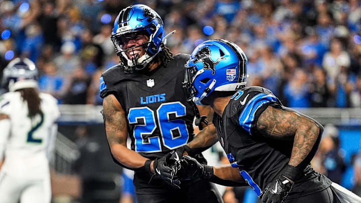 Detroit Lions running back Jahmyr Gibbs (26) with running back David Montgomery (5).
