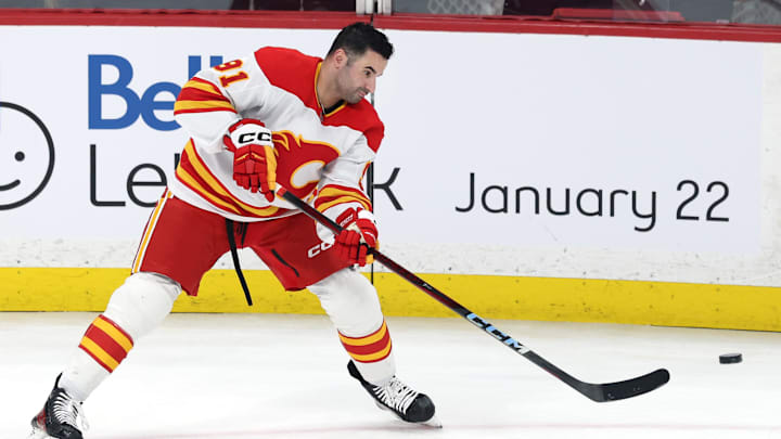 Jan 18, 2025; Winnipeg, Manitoba, CAN; Calgary Flames center Nazem Kadri (91) warms up before a game against the Winnipeg Jets at Canada Life Centre. Mandatory Credit: James Carey Lauder-Imagn Images