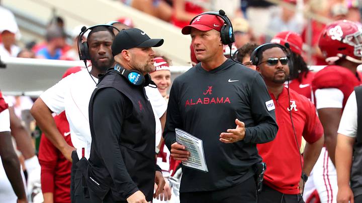 Sep 5, 2026; Tuscaloosa, Alabama, USA; Alabama Crimson Tide head coach Kalen DeBoer (right) talks with an assistant during the second quarter against the East Carolina Pirates at Saban Field at Bryant-Denny Stadium. Mandatory Credit: David Leong-Imagn Images Sep 5, 2026; Tuscaloosa, Alabama, USA; Alabama Crimson Tide head coach Kalen DeBoer (right) talks with an assistant during the second quarter against the East Carolina Pirates at Saban Field at Bryant-Denny Stadium. Mandatory Credit: David Leong-Imagn Images