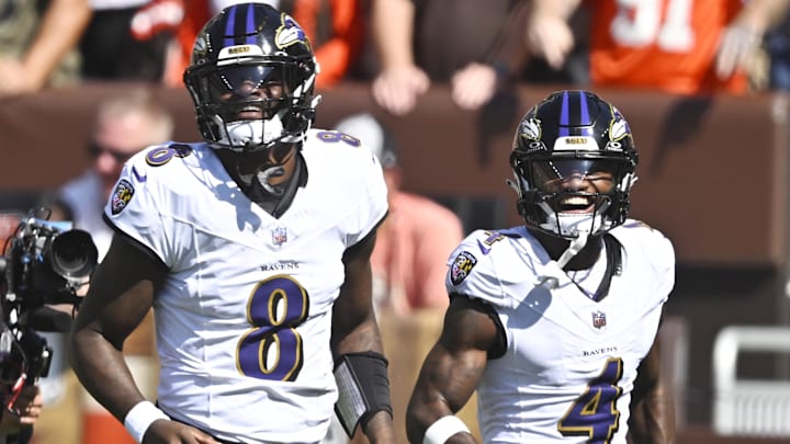 Baltimore Ravens quarterback Lamar Jackson (8) celebrates his rushing touchdown with wide receiver Zay Flowers (4) in the first quarter against the Cleveland Browns at Huntington Bank Stadium. Baltimore Ravens quarterback Lamar Jackson (8) celebrates his rushing touchdown with wide receiver Zay Flowers (4) in the first quarter against the Cleveland Browns at Huntington Bank Stadium.