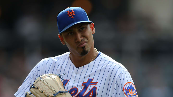 Edwin Diaz, of the Mets, is shown as he heads into the dugout after pitching the ninth inning.  Diaz gave up a two-run home-run during the inning.  The Mets went on to lose, 7-4.  Sunday, August 11, 2019