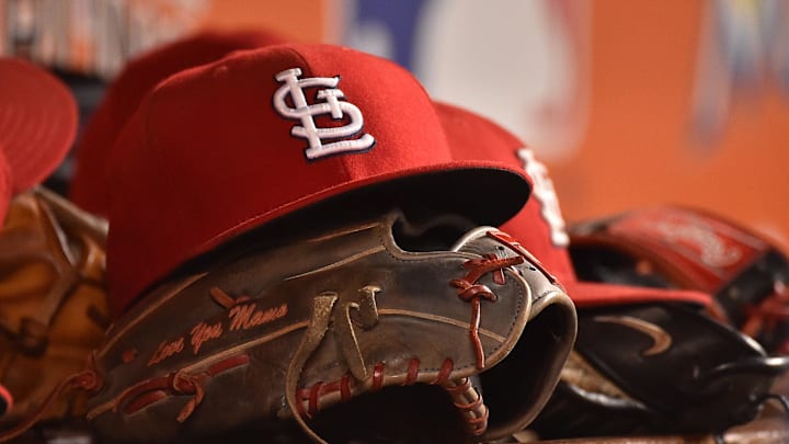 Jul 29, 2016; Miami, FL, USA; A detailed view of a hat and glove in the dugout of the St. Louis Cardinals in the game against the Miami Marlins at Marlins Park. The Cardinals defeated the Marlins 11-6. Mandatory Credit: Jasen Vinlove-Imagn Images Jul 29, 2016; Miami, FL, USA; A detailed view of a hat and glove in the dugout of the St. Louis Cardinals in the game against the Miami Marlins at Marlins Park. The Cardinals defeated the Marlins 11-6. Mandatory Credit: Jasen Vinlove-Imagn Images