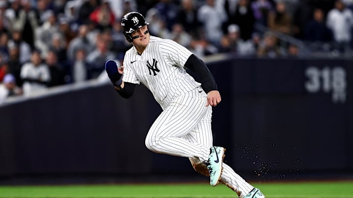 Oct 15, 2024; Bronx, New York, USA; New York Yankees first base Anthony Rizzo (48) gets caught in a pickle during the sixth inning against the Cleveland Guardians in game two of the ALCS for the 2024 MLB Playoffs at Yankee Stadium.