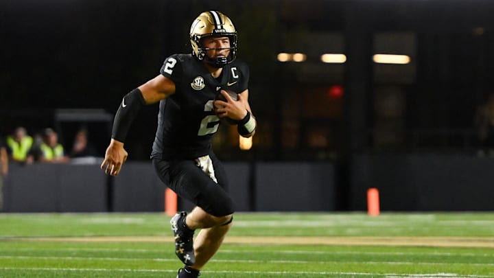 Aug 30, 2025; Nashville, Tennessee, USA;  Vanderbilt Commodores quarterback Diego Pavia (2) runs with the ball against the Charleston Southern Buccaneers during the second half at FirstBank Stadium. Mandatory Credit: Steve Roberts-Imagn Images