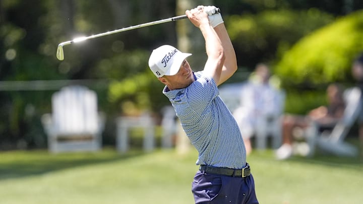 Apr 17, 2025; Hilton Head, South Carolina, USA; Justin Thomas hits his approach shot to eight green during the first round of the RBC Heritage golf tournament. 