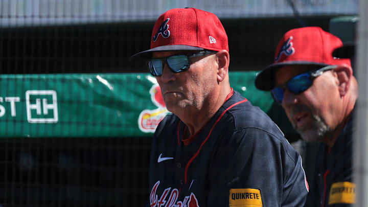 Feb 28, 2025; Jupiter, Florida, USA; Atlanta Braves manager Brian Snitker (43) watches the game against the Miami Marlins during the fifth inning at Roger Dean Chevrolet Stadium. Mandatory Credit: Sam Navarro-Imagn Images
