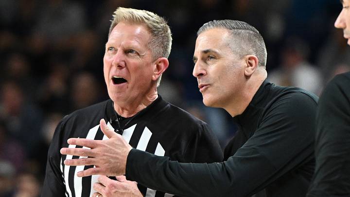 Feb 13, 2025; Spokane, Washington, USA; San Francisco Dons head coach Chris Gerlufsen talks with an official during a game against the Gonzaga Bulldogs.