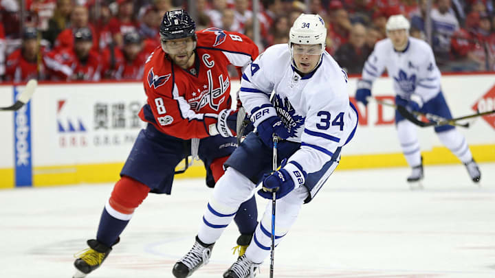 Apr 13, 2017; Washington, DC, USA; Toronto Maple Leafs center Auston Matthews (34) skates with the puck as Washington Capitals left wing Alex Ovechkin (8) defends in the second period in game one of the first round of the 2017 Stanley Cup Playoffs at Verizon Center. Mandatory Credit: Geoff Burke-Imagn Images Apr 13, 2017; Washington, DC, USA; Toronto Maple Leafs center Auston Matthews (34) skates with the puck as Washington Capitals left wing Alex Ovechkin (8) defends in the second period in game one of the first round of the 2017 Stanley Cup Playoffs at Verizon Center. Mandatory Credit: Geoff Burke-Imagn Images