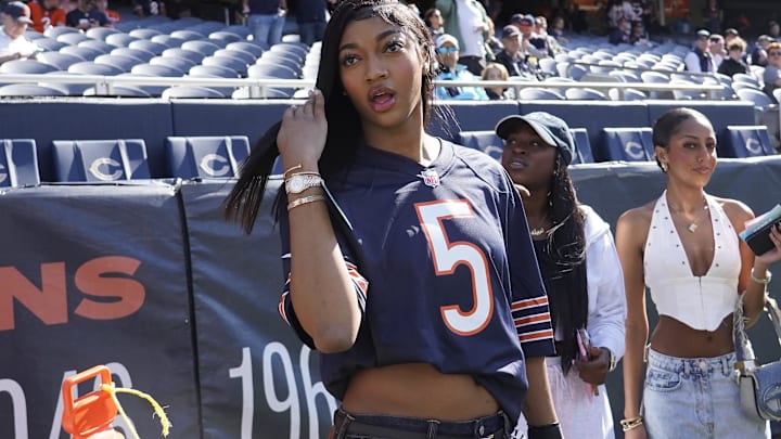 WNBA Chicago Sky player Angel Reese on the sidelines before the game between the Chicago Bears and the Carolina Panthers.
