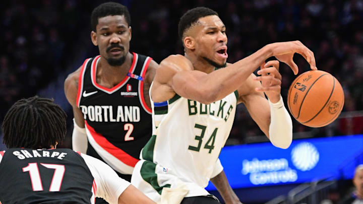 Jan 4, 2025; Milwaukee, Wisconsin, USA; Milwaukee Bucks forward Giannis Antetokounmpo (34) drives for the basket against Portland Trail Blazers center Deandre Ayton (2) in the third quarter at Fiserv Forum. Mandatory Credit: Benny Sieu-Imagn Images Jan 4, 2025; Milwaukee, Wisconsin, USA; Milwaukee Bucks forward Giannis Antetokounmpo (34) drives for the basket against Portland Trail Blazers center Deandre Ayton (2) in the third quarter at Fiserv Forum. Mandatory Credit: Benny Sieu-Imagn Images