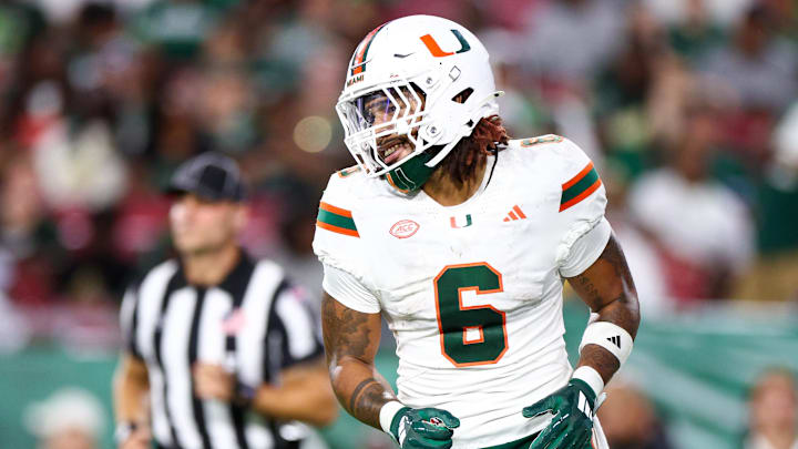 Sep 21, 2024; Tampa, Florida, USA; Miami Hurricanes running back Damien Martinez (6) reacts after scoring a touchdown against the South Florida Bulls in the third quarter at Raymond James Stadium.