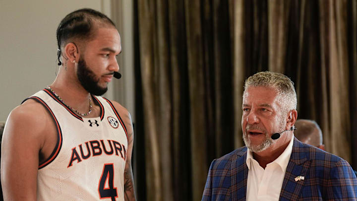 Auburn head coach Bruce Pearl talks to player Johni Broome during SEC Media Day at the Grand Bohemian Hotel in Mountain Brook Tuesday, Oct. 15, 2024.