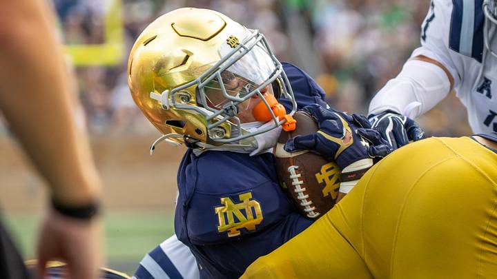 Sep 12, 2026; South Bend, Indiana, USA; Notre Dame Fighting Irish running back Nolan James Jr. (2) scores against the Rice Owls during the first half at Notre Dame Stadium. Sep 12, 2026; South Bend, Indiana, USA; Notre Dame Fighting Irish running back Nolan James Jr. (2) scores against the Rice Owls during the first half at Notre Dame Stadium.