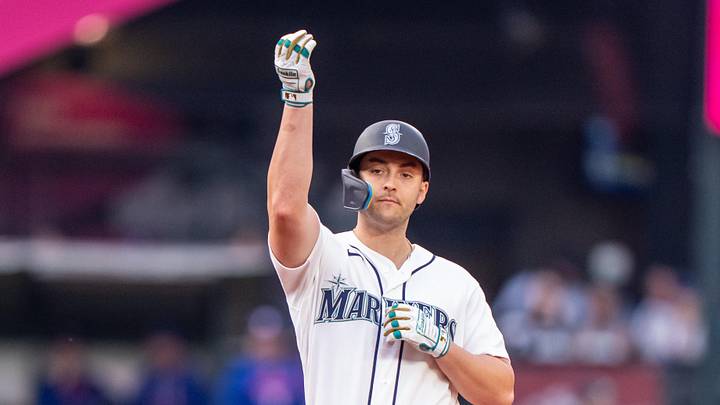 Apr 18, 2026; Seattle, Washington, USA; Seattle Mariners designated hitter Dominic Canzone (8) celebrates at second base after hitting a double during the eighth inning against the Texas Rangers at T-Mobile Park. Mandatory Credit: Stephen Brashear-Imagn Images