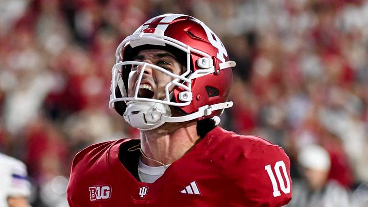 Sep 25, 2026; Bloomington, Indiana, USA; Indiana Hoosiers quarterback Josh Hoover (10) celebrates after running for a touchdown against the Northwestern Wildcats during the second half at Merchants Bank Field at Memorial Stadium. Mandatory Credit: Robert Goddin-Imagn Images Sep 25, 2026; Bloomington, Indiana, USA; Indiana Hoosiers quarterback Josh Hoover (10) celebrates after running for a touchdown against the Northwestern Wildcats during the second half at Merchants Bank Field at Memorial Stadium. Mandatory Credit: Robert Goddin-Imagn Images