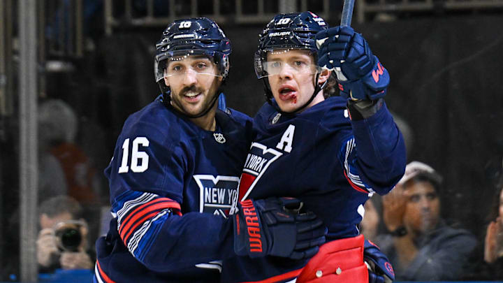 Apr 9, 2025; New York, New York, USA;  New York Rangers left wing Artemi Panarin (10) celebrates his goal with New York Rangers center Vincent Trocheck (16) against the Philadelphia Flyers during the second period at Madison Square Garden. Mandatory Credit: Dennis Schneidler-Imagn Images