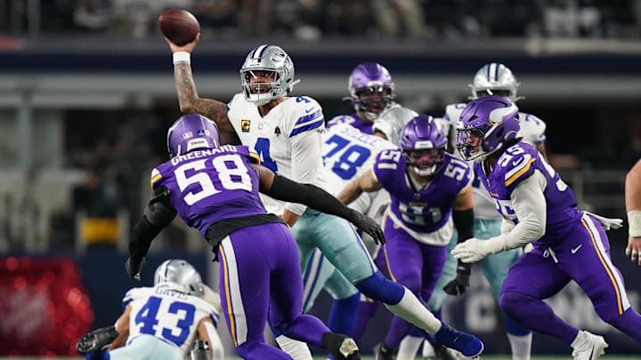 Dec 14, 2025; Arlington, Texas, USA; Dallas Cowboys quarterback Dak Prescott (4) throws against Minnesota Vikings linebacker Jonathan Greenard (58) and linebacker Eric Wilson (55) during the second half at AT&T Stadium.