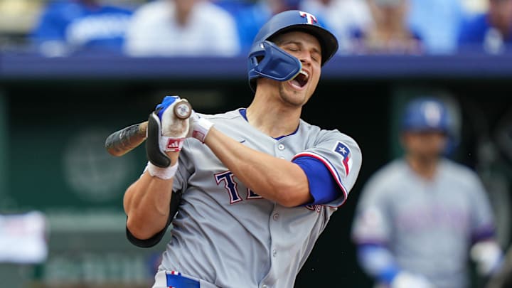 Texas Rangers shortstop Corey Seager (5) reacts after fouling a ball off of his leg during the ninth inning against the Kansas City Royals at Kauffman Stadium. Texas Rangers shortstop Corey Seager (5) reacts after fouling a ball off of his leg during the ninth inning against the Kansas City Royals at Kauffman Stadium.