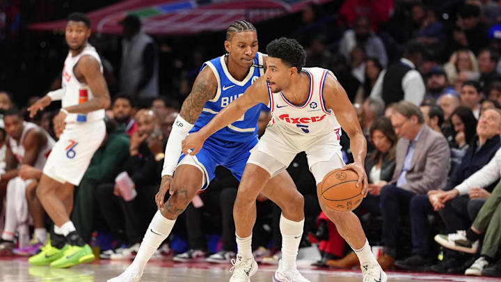 Apr 3, 2025; Philadelphia, Pennsylvania, USA; Philadelphia 76ers guard Quentin Grimes (5) controls the ball against Milwaukee Bucks guard Kevin Porter Jr (3) in the second quarter at Wells Fargo Center. Mandatory Credit: Kyle Ross-Imagn Images