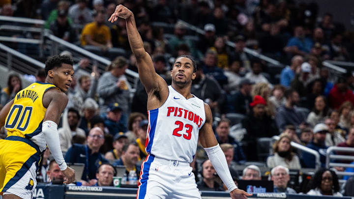Nov 29, 2024; Indianapolis, Indiana, USA; Detroit Pistons guard Jaden Ivey (23) celebrates a shot in the second half against the Indiana Pacers at Gainbridge Fieldhouse. Mandatory Credit: Trevor Ruszkowski-Imagn Images
