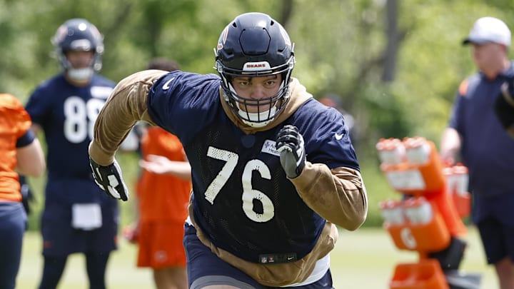 May 31, 2024; Lake Forest, IL, USA; Chicago Bears offensive tackle Teven Jenkins (76) runs during organized team activities at Halas Hall. Mandatory Credit: Kamil Krzaczynski-Imagn Images