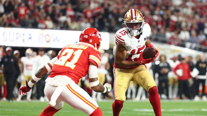 Feb 11, 2024; Paradise, Nevada, USA; San Francisco 49ers wide receiver Jauan Jennings (15) scores a touchdown against Kansas City Chiefs safety Mike Edwards (21) in the second half in Super Bowl LVIII at Allegiant Stadium.