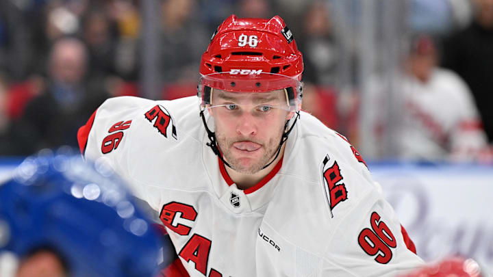 Feb 22, 2025; Toronto, Ontario, CAN;  Carolina Hurricanes forward Mikko Rantanen (96) prepares for a face-off against the Toronto Maple Leafs in the second period at Scotiabank Arena. Mandatory Credit: Dan Hamilton-Imagn Images