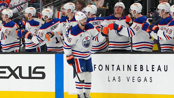 Apr 1, 2025; Las Vegas, Nevada, USA; Edmonton Oilers defenseman Jake Walman (96) celebrates after scoring a goal against the Vegas Golden Knights during the second period at T-Mobile Arena. Mandatory Credit: Stephen R. Sylvanie-Imagn Images