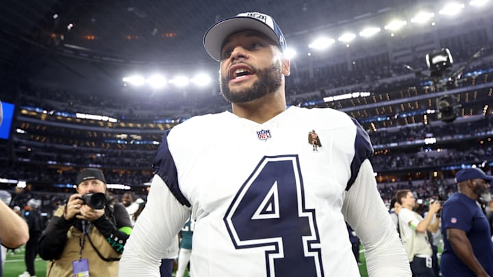 Dec 10, 2023; Arlington, Texas, USA; Dallas Cowboys quarterback Dak Prescott (4) smiles on the field