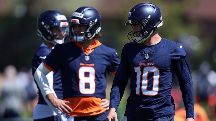May 23, 2024; Englewood, CO, USA; Denver Broncos quarterback Bo Nix (10) and quarterback Jarrett Stidham (8) during organized team activities at Centura Health Training Center. Mandatory Credit: Isaiah J. Downing-USA TODAY Sports