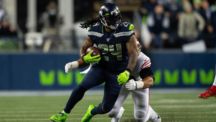 Dec 29, 2019; Seattle, Washington, USA; Seattle Seahawks running back Marshawn Lynch (24) carries the ball against the San Francisco 49ers during the second half at CenturyLink Field. San Francisco defeated Seattle 26-21. Mandatory Credit: Steven Bisig-Imagn Images Dec 29, 2019; Seattle, Washington, USA; Seattle Seahawks running back Marshawn Lynch (24) carries the ball against the San Francisco 49ers during the second half at CenturyLink Field. San Francisco defeated Seattle 26-21. Mandatory Credit: Steven Bisig-Imagn Images