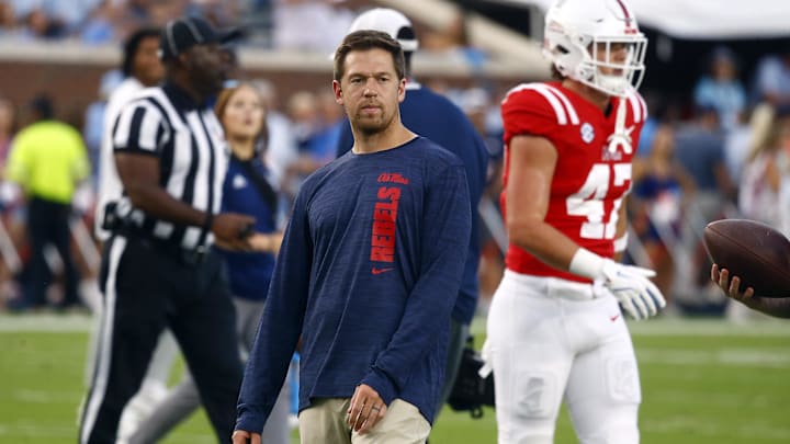 Sep 21, 2024; Oxford, Mississippi, USA; Mississippi Rebels offensive coordinator Charlie Weis Jr. watches during warm ups prior to the game against the Georgia Southern Eagles at Vaught-Hemingway Stadium. Mandatory Credit: Petre Thomas-Imagn Images