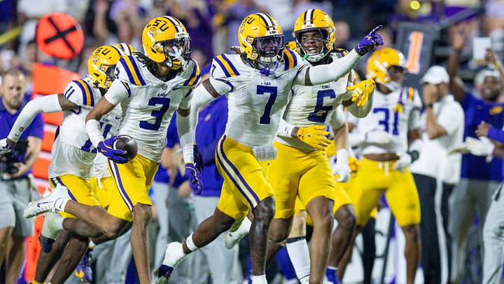 LSU defenders celebrate after an interception against Western Kentucky in 2025 LSU defenders celebrate after an interception against Western Kentucky in 2025