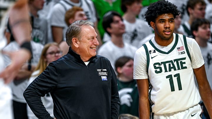Michigan State's head coach Tom Izzo, left, smiles while talking with Jase Richardson during the game against Minnesota on Tuesday, Jan. 28, 2025, at the Breslin Center in East Lansing.