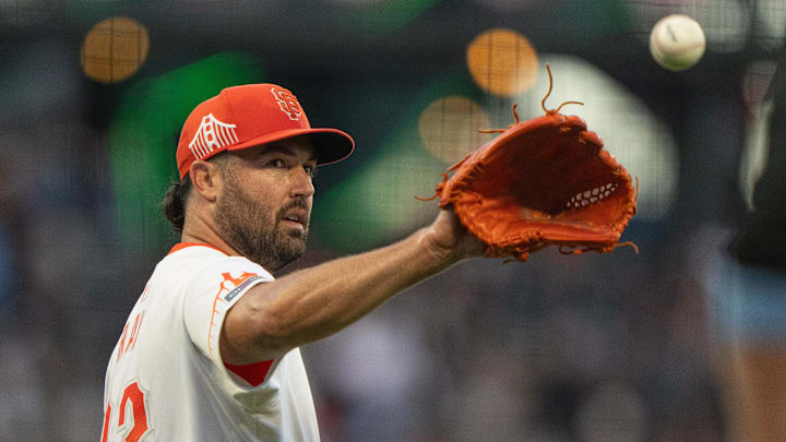 Aug 20, 2024; San Francisco, California, USA;  San Francisco Giants pitcher Robbie Ray (23) catches the ball during the third inning against the Chicago White Sox at Oracle Park. 