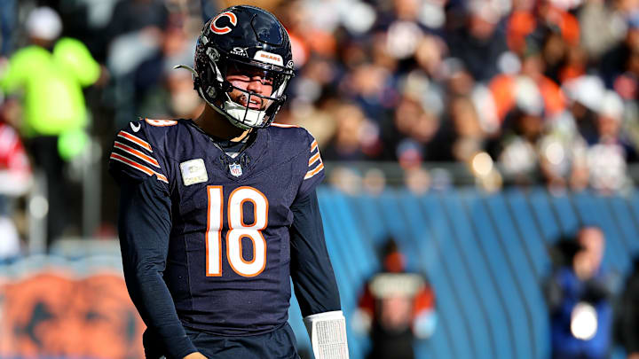 Nov 10, 2024; Chicago, Illinois, USA; Chicago Bears quarterback Caleb Williams (18) reacts after a pass against the New England Patriots during the second half at Soldier Field. Mandatory Credit: Mike Dinovo-Imagn Images