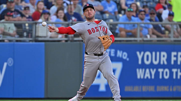 May 10, 2025; Kansas City, Missouri, USA;  Boston Red Sox third baseman Alex Bregman (2) throws to first base in the first inning against the Kansas City Royals at Kauffman Stadium. Mandatory Credit: Peter Aiken-Imagn Images