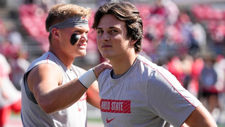 Oct 5, 2024; Columbus, OH, USA; Ohio State Buckeyes quarterback Julian Sayin and quarterback Lincoln Kienholz warm up prior to the NCAA football game against the Iowa Hawkeyes at Ohio Stadium.