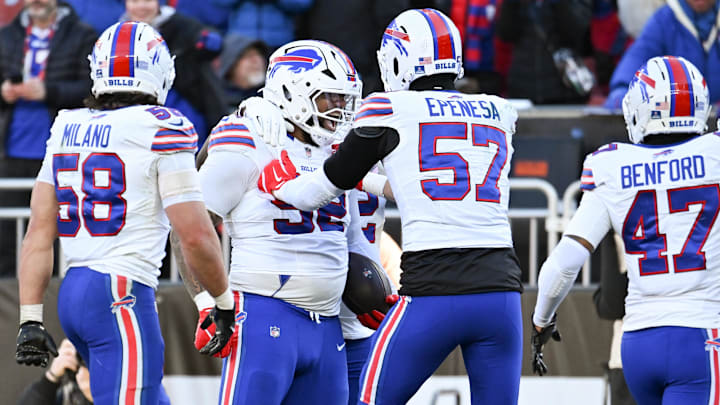 Buffalo Bills DT Daquan Jones reacts with DE AJ Epenesa after an interception against the Cleveland Browns.