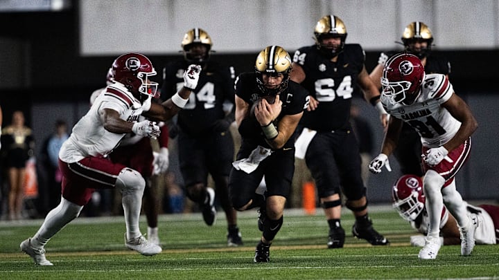 Vanderbilt Commodores quarterback Diego Pavia (2) runs against South Carolina Gamecocks’s defense during the third quarter at FirstBank Stadium in Nashville, Tenn., Saturday, Nov. 9, 2024.