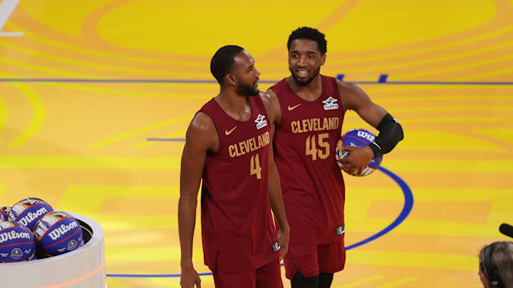 Feb 15, 2025; San Francisco, CA, USA; Team Cavs guard Donovan Mitchell (45) and center Evan Mobley (4) of the Cleveland Cavaliers celebrate after winning the skills challenge during All Star Saturday Night ahead of the 2025 NBA All Star Game at Chase Center. Mandatory Credit: Cary Edmondson-Imagn Images