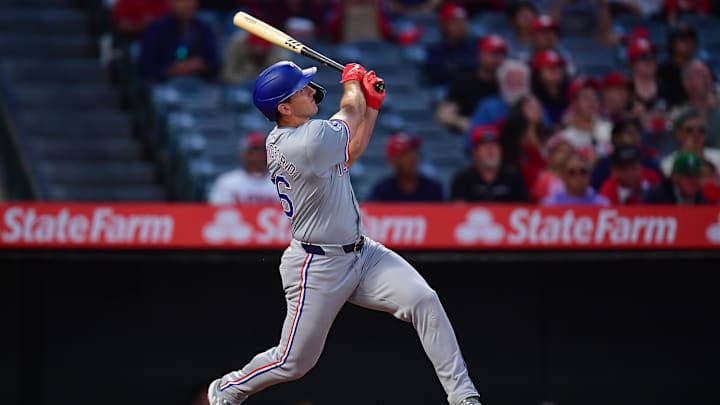 Sep 27, 2024; Anaheim, California, USA; Texas Rangers center fielder Wyatt Langford (36) hits a two run home run against the Los Angeles Angels during the first inning at Angel Stadium. Sep 27, 2024; Anaheim, California, USA; Texas Rangers center fielder Wyatt Langford (36) hits a two run home run against the Los Angeles Angels during the first inning at Angel Stadium.