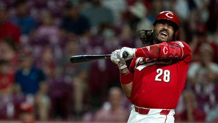 Cincinnati Reds designated hitter Eugenio Suarez (28) reacts after being hit by pitch in the ninth inning between the Milwaukee Brewers and Cincinnati Reds at Great American Ball Park in Cincinnati on Wednesday, June 24, 2026.