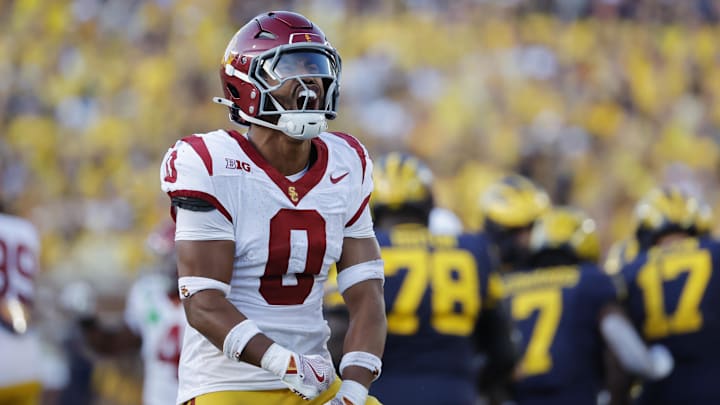 Sep 21, 2024; Ann Arbor, Michigan, USA;  USC Trojans safety Akili Arnold (0) celebrates in the second half against the Michigan Wolverines at Michigan Stadium. Mandatory Credit: Rick Osentoski-Imagn Images