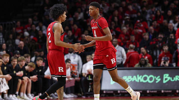 Jan 9, 2025; Piscataway, New Jersey, USA; Rutgers Scarlet Knights guard Dylan Harper (2) slaps hands with guard Ace Bailey (4) during the first half against the Purdue Boilermakers at Jersey Mike's Arena. Mandatory Credit: Vincent Carchietta-Imagn Images