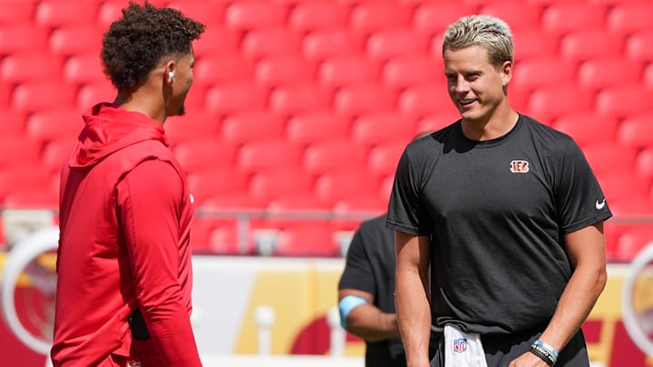 Sep 15, 2024; Kansas City, Missouri, USA; Kansas City Chiefs quarterback Patrick Mahomes (15) talks with Cincinnati Bengals quarterback Joe Burrow (9) on field prior to a game at GEHA Field at Arrowhead Stadium. Mandatory Credit: Denny Medley-Imagn Images