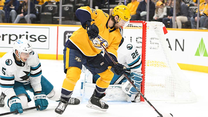 Oct 21, 2023; Nashville, Tennessee, USA;  Nashville Predators center Tommy Novak (82) takes a shot