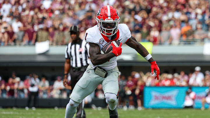 Nov 8, 2025; Starkville, Mississippi, USA; Georgia Bulldogs wide receiver Zachariah Branch (1) runs for a touchdown against the Mississippi State Bulldogs during the first half at Davis Wade Stadium at Scott Field. Mandatory Credit: Wesley Hale-Imagn Images